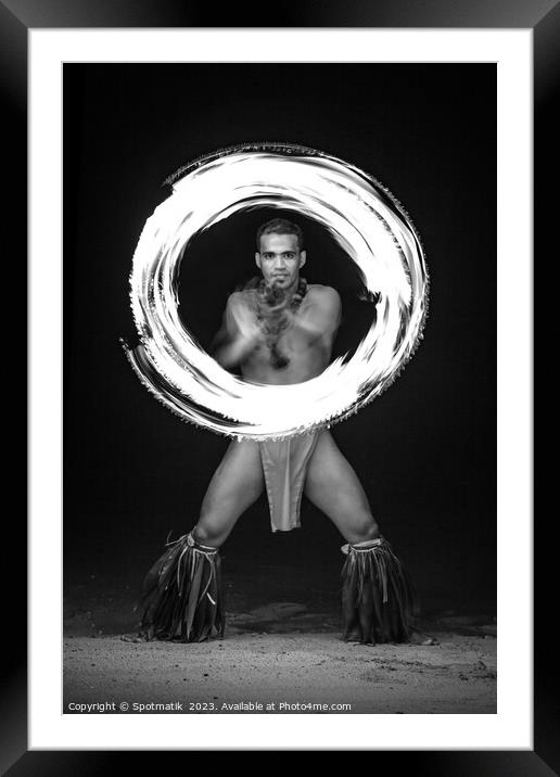 Male Fire dancer with illuminated spinning flaming torch  Framed Mounted Print by Spotmatik 