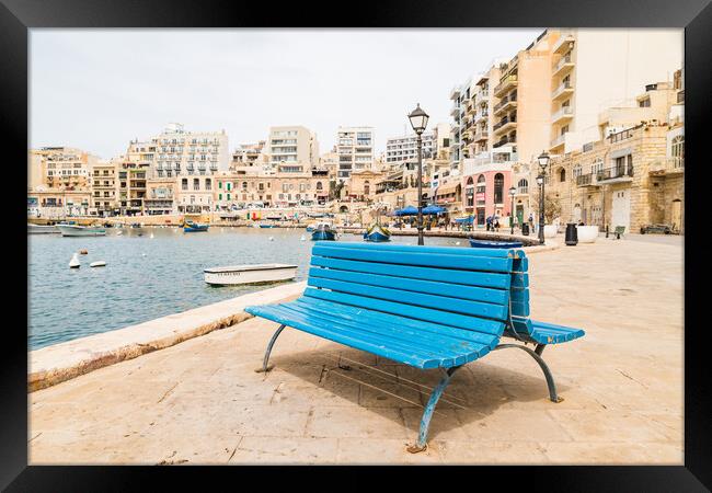 Blue bench on the promenade at Spinola Bay Framed Print by Jason Wells