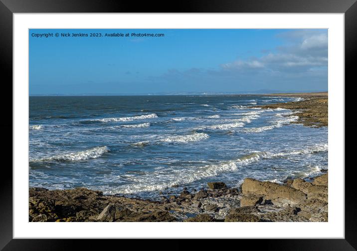 A view across Rest Bay Porthcawl on a breezy cold January winter day Framed Mounted Print by Nick Jenkins