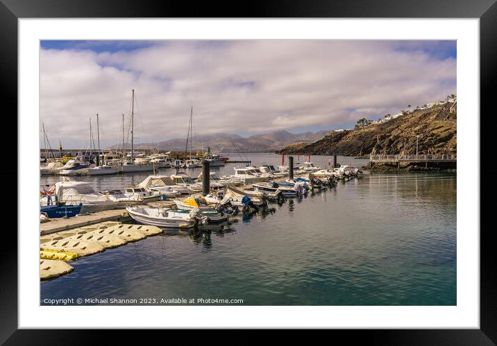 Rows of boats in the harbour. Puerto del Carmen, L Framed Mounted Print by Michael Shannon