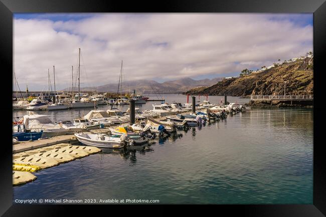 Rows of boats in the harbour. Puerto del Carmen, L Framed Print by Michael Shannon