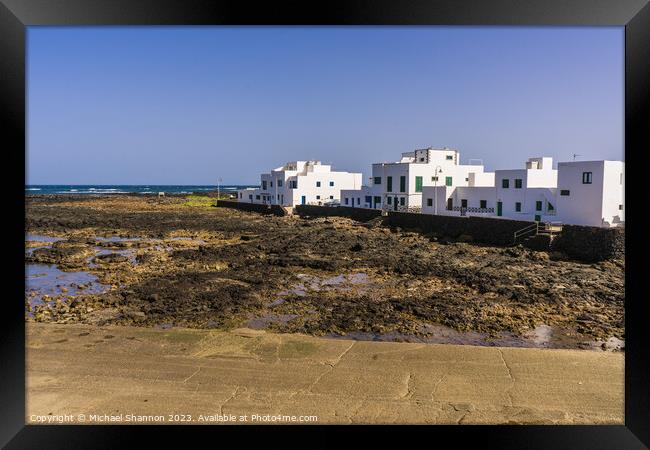 Beachfront houses, Orzola, Northern Lanzarote. Framed Print by Michael Shannon