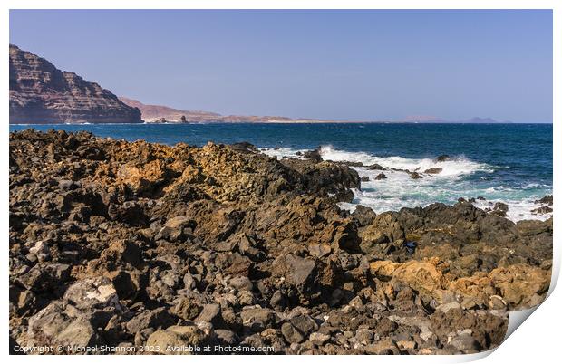 The wild rocky coastline near Orzola in Northern L Print by Michael Shannon