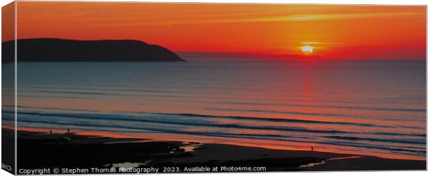 Strollers Basking in Woolacombe Beach's Twilight Canvas Print by Stephen Thomas Photography 