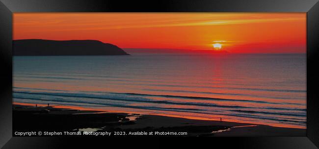 Strollers Basking in Woolacombe Beach's Twilight Framed Print by Stephen Thomas Photography 