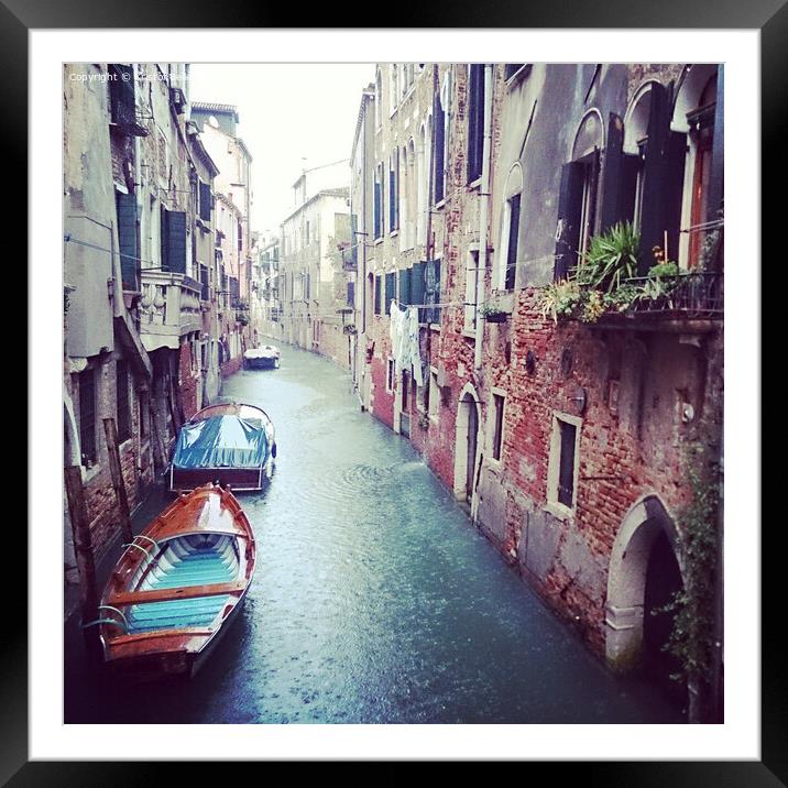 Boats in a small canal in Venice during a rainy day in Autumn Framed Mounted Print by Kristof Bellens
