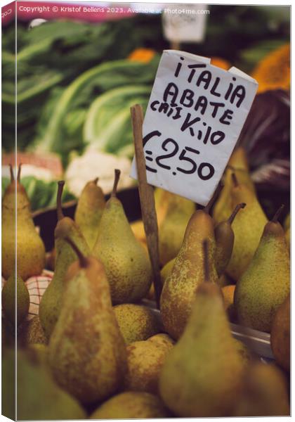 Italian Abate pears with price tag for sale in a market stall. Canvas Print by Kristof Bellens