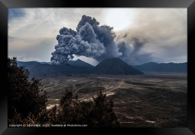Indonesia ash cloud from active Mount Bromo volcano  Framed Print by Spotmatik 