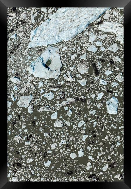 Aerial view ice flows broken from glacier Alaska Framed Print by Spotmatik 
