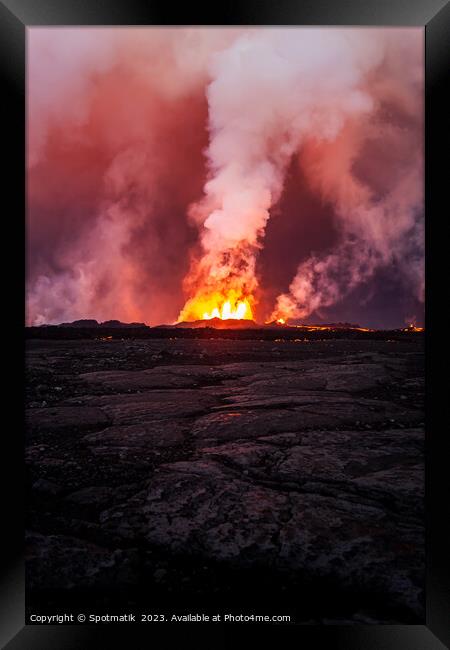 Aerial view of Icelandic active volcanic fissure eruption Framed Print by Spotmatik 