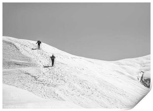 Two Hikers on a trail walking through snow. Winter landscape in Carapathian Mountains, Romania. Print by Cristi Croitoru