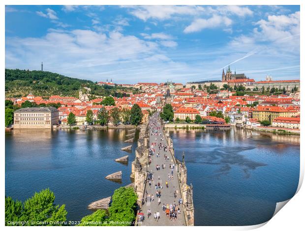  View from above with the Charles Bridge main touristic attraction with the Prague Castle in the background Print by Cristi Croitoru