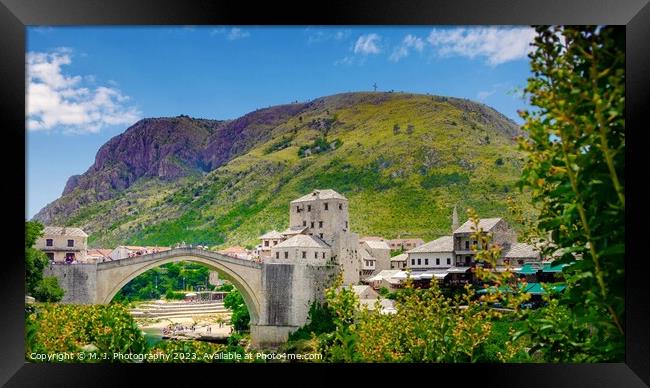 A bridge over a river in Mostar Framed Print by M. J. Photography