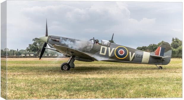 Spitfire starting up Canvas Print by Alan Tunnicliffe
