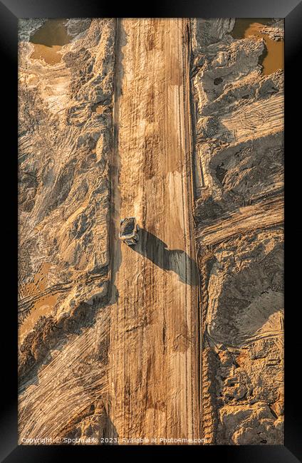 Aerial view Oilsands mining area large dump trucks  Framed Print by Spotmatik 