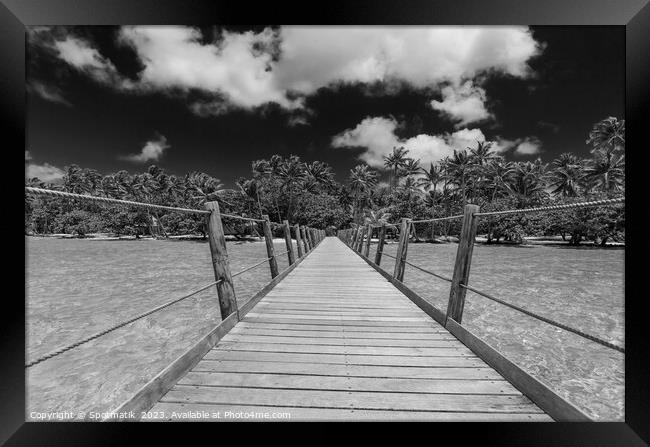 Bora Bora Island jetty in luxury tropical resort Framed Print by Spotmatik 