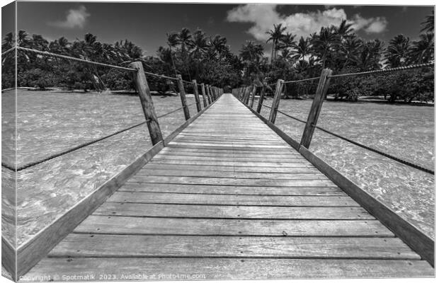 Bora Bora wooden walkway over tropical Aquamarine lagoon  Canvas Print by Spotmatik 