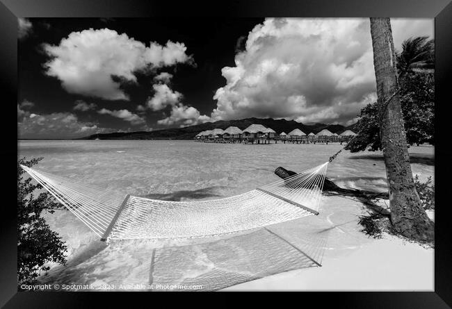 Beach hammock Bora Bora with Overwater luxury Bungalows  Framed Print by Spotmatik 