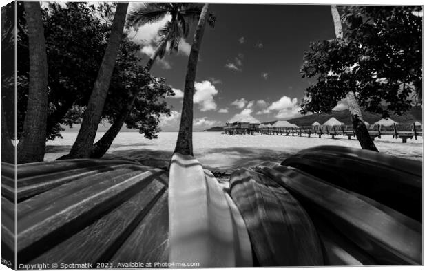 Bora Bora canoes Overwater Bungalows luxury resort Polynesia Canvas Print by Spotmatik 