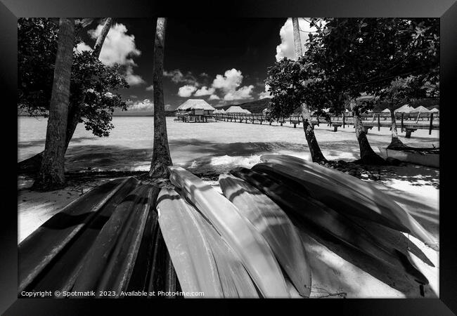 Bora Bora canoe boats Overwater Bungalows luxury resort  Framed Print by Spotmatik 