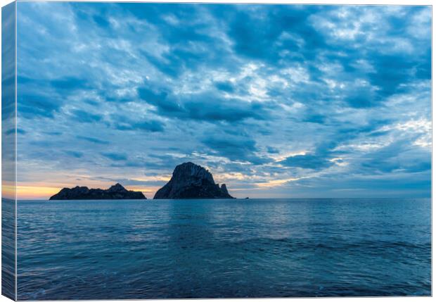 Photography with a cloudy sunset from Cala d'hort with Es Vedra as the protagonist Canvas Print by Vicen Photo