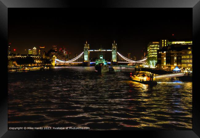 Tower Bridge and HMS Belfast at night Framed Print by Mike Hardy