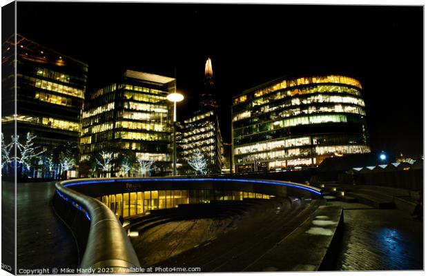London Shard behind illuminated buildings on the Thames Canvas Print by Mike Hardy