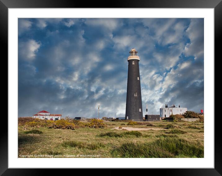 Dungeness Lighthouses under moody skies. Framed Mounted Print by Mike Hardy