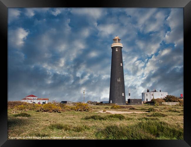 Dungeness Lighthouses under moody skies. Framed Print by Mike Hardy