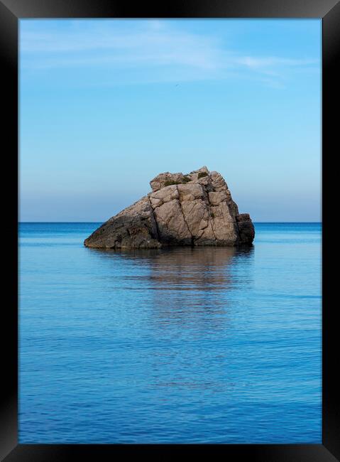 Photography with a lonely little island in Ibiza on a calm day at sea Framed Print by Vicen Photo