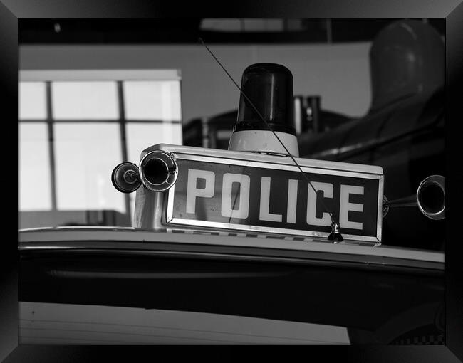 Retro Police Car Framed Print by Emma Dickson