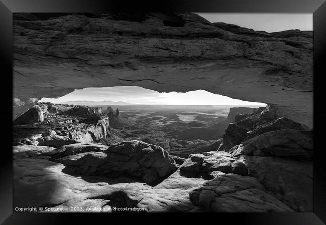 View of the rising sun Mesa sandstone Arch  Framed Print by Spotmatik 