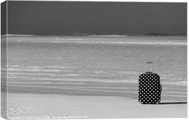 Red polka dot travel suitcase on sand beach Canvas Print by Spotmatik 
