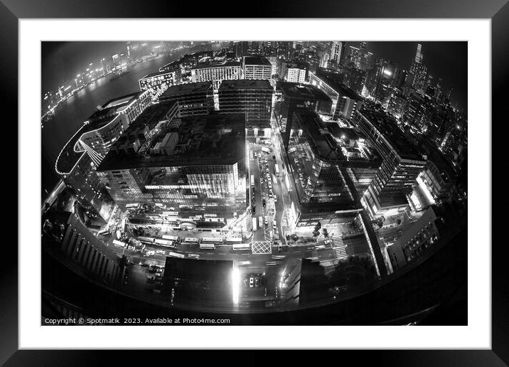Hong Kong illuminated city traffic and skyscrapers downtown Framed Mounted Print by Spotmatik 