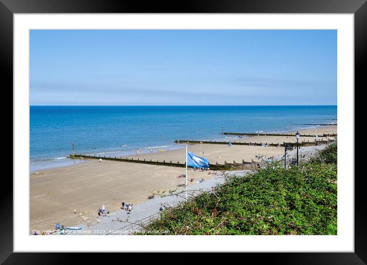 Sheringham Blue Flag Beach Framed Mounted Print by Diana Mower