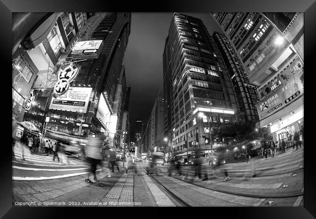 Hong Kong illuminated buildings busy pedestrian city crossing  Framed Print by Spotmatik 