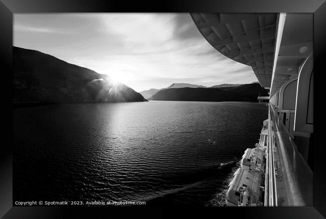 View of shoreline from Cruise Ship at sunset  Framed Print by Spotmatik 