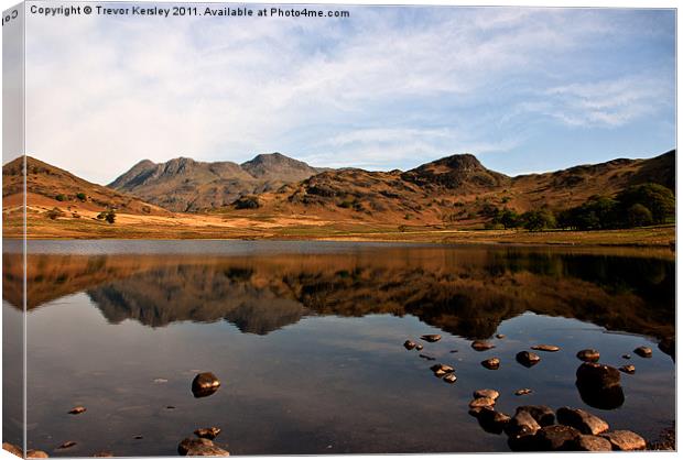 Peaceful Waters in the Lake District Canvas Print by Trevor Kersley RIP
