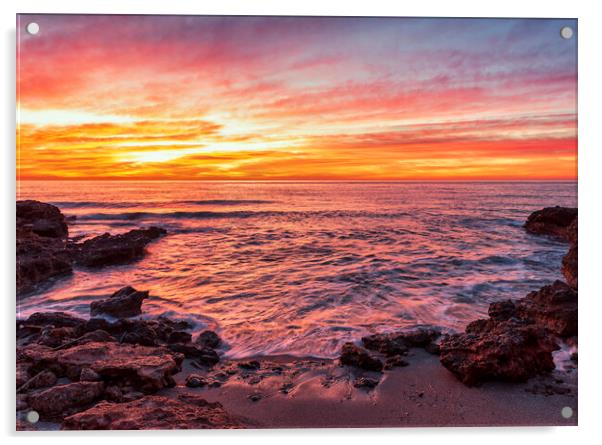 Photograph with a reddish sunrise in a small cove of la renega in Oropesa Acrylic by Vicen Photo