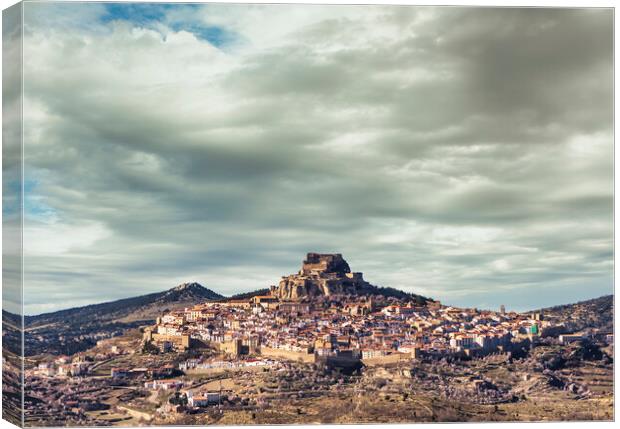Photography with the town of Morella under a cloudy sky Canvas Print by Vicen Photo