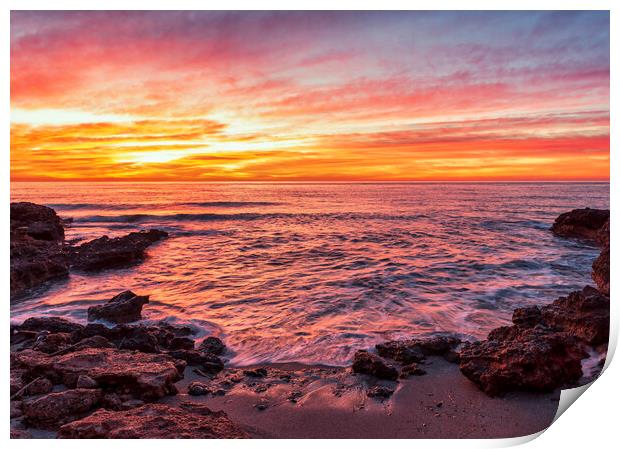 Photograph with a reddish sunrise in a small cove of la renega in Oropesa Print by Vicen Photo