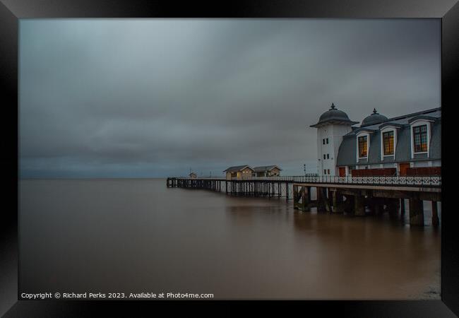 Dramatic Storm Clouds Engulf Penarth Pier Framed Print by Richard Perks