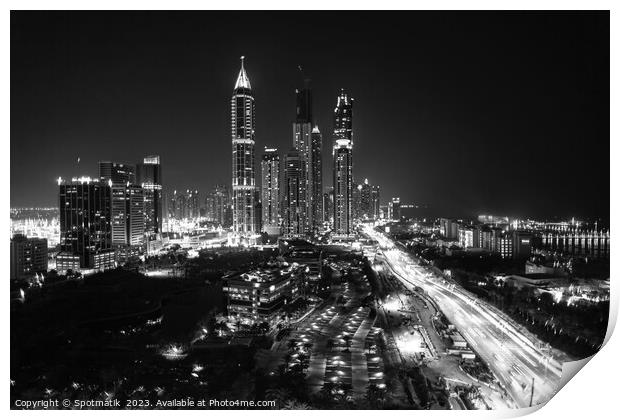 Night Dubai illuminated view of modern city Skyscrapers Print by Spotmatik 