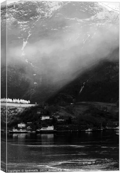 Sunlight beaming through light mist Norwegian glacial fjord  Canvas Print by Spotmatik 