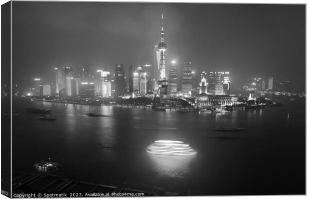 Illuminated Huangpu River Shanghai and Oriental Pearl Tower  Canvas Print by Spotmatik 