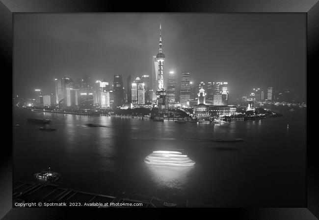 Illuminated Huangpu River Shanghai and Oriental Pearl Tower  Framed Print by Spotmatik 