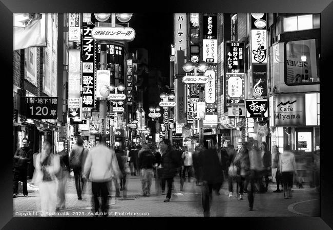 Tokyo Japan Illuminated night Motion blur Ginza Shibuya  Framed Print by Spotmatik 