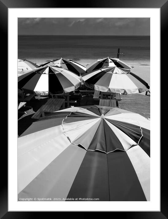 Colorful beach umbrellas in the tropical sunshine Caribbean Framed Mounted Print by Spotmatik 