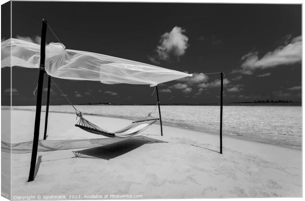 Hammock on the shoreline remote luxury paradise Island  Canvas Print by Spotmatik 