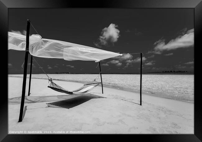 Hammock on the shoreline remote luxury paradise Island  Framed Print by Spotmatik 